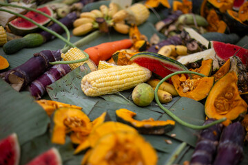 Watermelon slices and various fruits on banana leaves covered with banana leaves with various fruits. Elephant food at Thai Elephant Day, Elephant feeding fruit that it eats a lot of