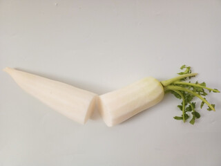 Fresh white radish in isolated on white background.
