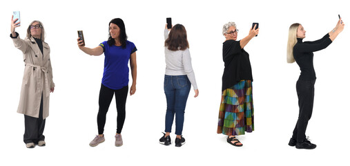 group of women taking a self-portrait with smartphone on white background