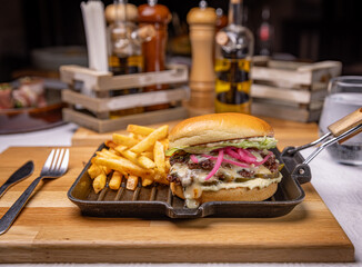 Gourmet burger with melted cheese