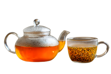 Glass teapot and cup of tea on transparent background