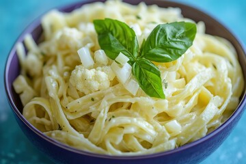 Creamy pasta dish with cauliflower and basil.
