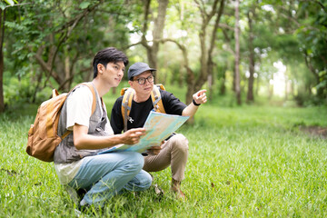 Father and Son Hiking Together. Enjoying a moment of exploration in the forest.