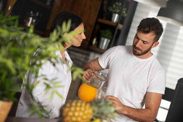 Young couple having breakfast together
