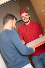 Man receiving pizza delivery