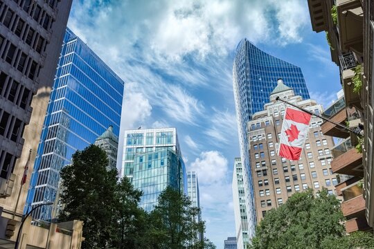 Vancouver, city in Canada, buildings with the Canadian flag
