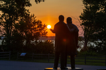 father and son at sunset