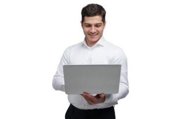 Young professional working on a laptop with a smile, showcasing the joy of technology