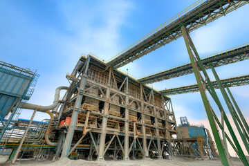 The crushing plant and conveyor belts at a Chilean copper mine, showcasing the heavy machinery of...