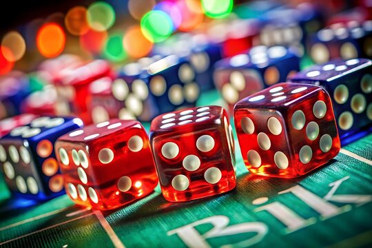 Close up of colorful dice on a casino table with blurred background and the word bik