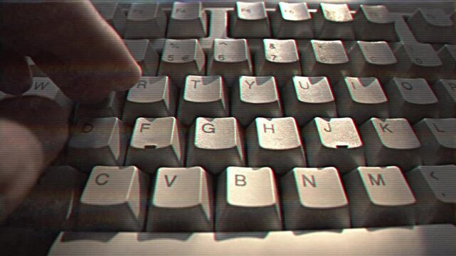 Computer engineer developer is working on old vintage computer 1990s. Antique classic pc keyboard and programmer typing hands. Internet web digital startup history. Outdated retro technology concept