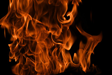 Fire flames on black background. Fire burn flame isolated, abstract texture. Flaming effect with...