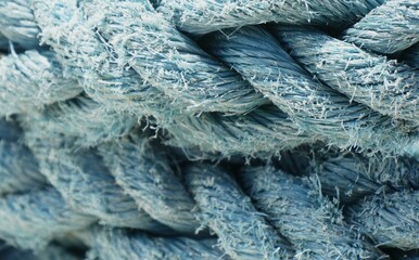 Blue rope for the boat by the sea nautical background