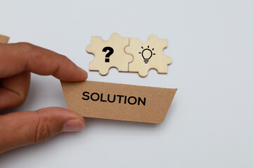 Letters of the alphabet with the word solution problem and solution icon completing final puzzle