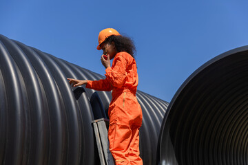 Industry Engineers Walking Inside Circular water Pipe. Engineering or Worker inspection pipe...