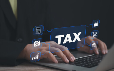 Person typing on laptop with digital TAX interface featuring finance-related icons, symbolizing tax management, calculation, e-filing, percentage analysis, budgeting, and digital business finance.