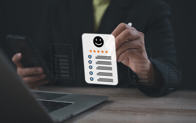 Individual reviewing digital feedback form with five-star rating and smiley face, representing positive customer experience, satisfaction level, and service quality assessment in business interactions