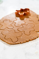 Preparing and Baking Classic Gingerbread Cookies in Gingerbread Man Shapes