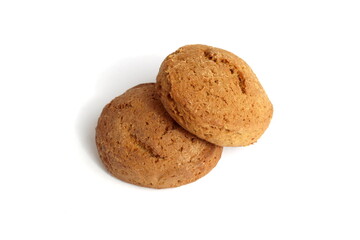 Fresh oatmeal cookies lie on a white background.