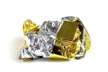 On a white isolated background lies foil for keeping warm in a critical situation.	