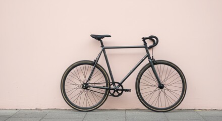 Fototapeta premium Minimalist and modern pastel-colored photo of a bike parked against a wall with an unusual yet beautiful camera angle with natural lighting a clean background with no text styled for a poster or webs