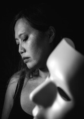 Woman Behind White Mask