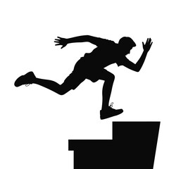 Silhouette of a man jumping stairs