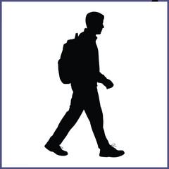 Silhouette of a young man walking with backpack