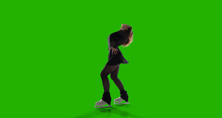 Obraz premium Figure skating woman on green screen background.