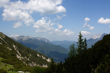 Beautiful Zireinersee lake area in Tyrol, Austria showcasing lush greenery and majestic mountains under a clear blue sky