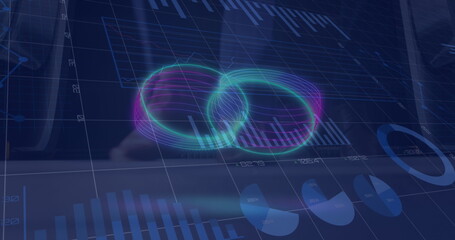 Hovering neon green and purple rings glowing above tech workspace, with bar, line and pie charts