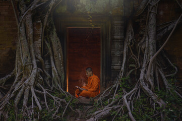 Monk exploring old ruins