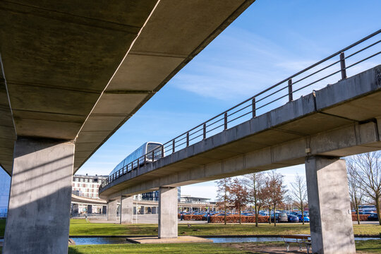 View of elevated metro bridge structure in Havnestad, Copenhagen, Denmark, modern transit infrastructure and pedestrian-friendly design