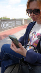 Close-up of a young woman with a phone17