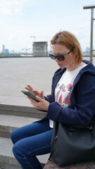 Close-up of a young woman with a phone27