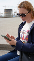 Close-up of a young woman with a phone26