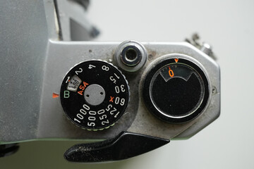 Nottingham, Nottinghamshire, England – June 17 2025: This image shows a close-up of the shutter speed dial of a vintage film camera.