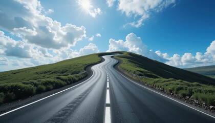 An asphalt road curves up a grassy hill under a sunny, cloudy sky.