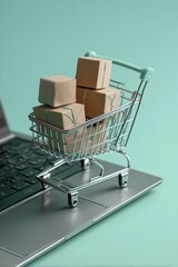 Creative Online Store Visual with Mini Cart and Delivery Boxes Arranged on Laptop Keyboard