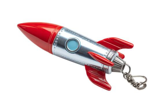 Red and silver vintage rocket keychain. Space travel, adventure, startup concept.