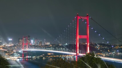 Istanbul background 4k footage. 15th July martyrs' Bridge and spotlights at night.