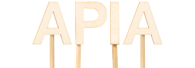 The word Apia, capital of Samoa, formed with wooden letters with sticks