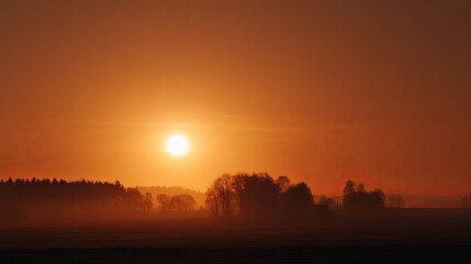 Peaceful sunrise over hammelburg countryside with golden morning light