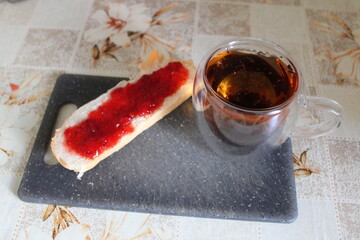 Enjoy a relaxing moment with a cup of tea and a steaming hot beverage served on a stylish slate...