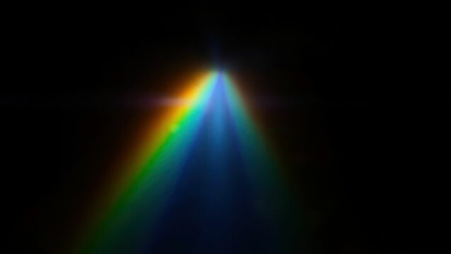 Blurred rainbow refraction overlay effect. Light lens prism effect on black background. Holographic reflection, crystal flare leak shadow overlay. Colorful rainbow disco ball light