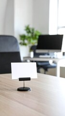Blank card with modern office desk.