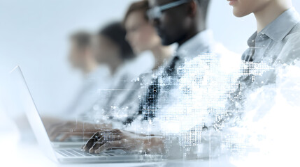 Image of data processing over diverse business people using laptop global business and digital interface concept digitally generated image 