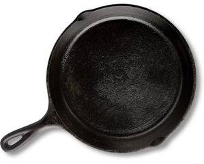 A cast iron skillet with a smooth, dark surface, ideal for cooking a variety of dishes.