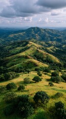 Obraz premium Misty Green Mountain Range Aerial View Dramatic Landscape Photography