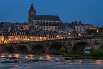 View of the Loire River embankment with Saint Louis Cathedral and the Jacques Gabriel Bridge on an early summer morning, Blois, Loire and Cher, France